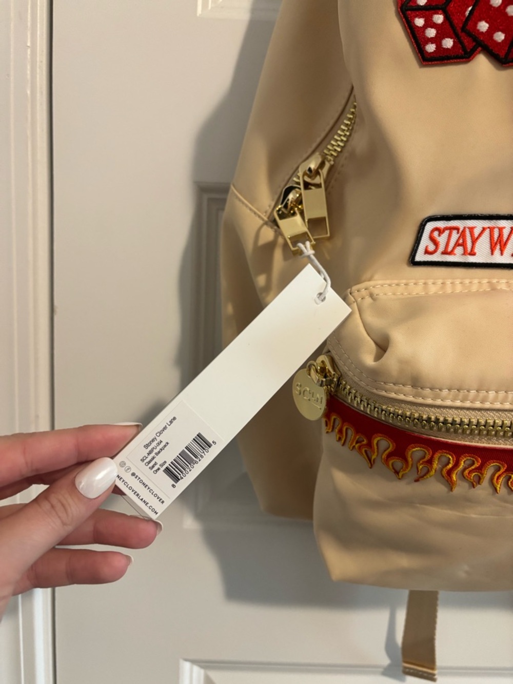 Stoney Clover Lane cream backpack with patches - Picture 3 of 13